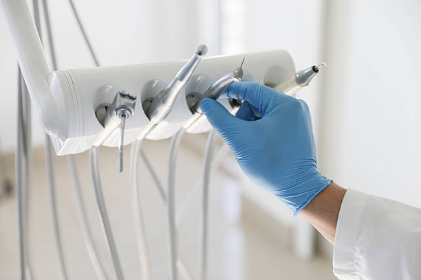 Professional Wisdom Tooth Removal technician working in West DeLand, FL